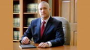 Aaron L Bensinger