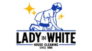 Lady In White House Cleaning